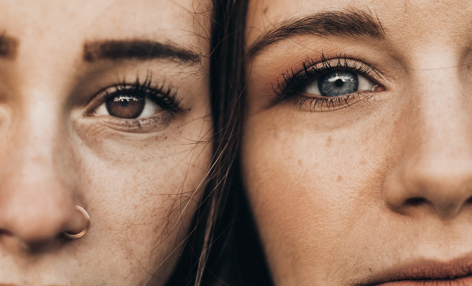 Two women’s face side by side