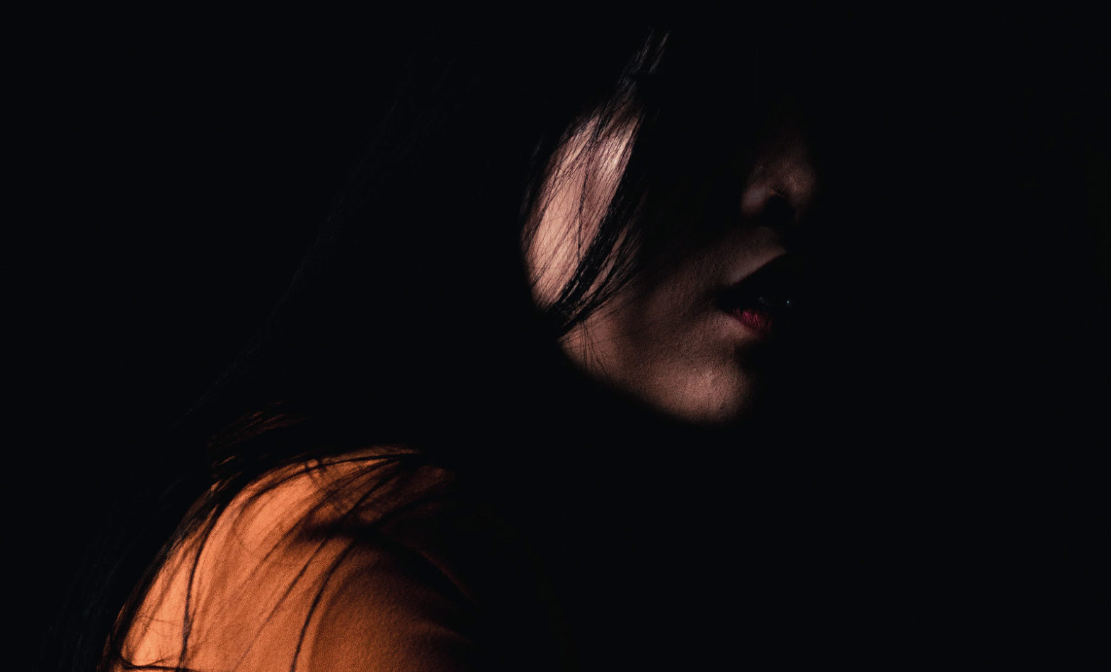 A woman in the dark