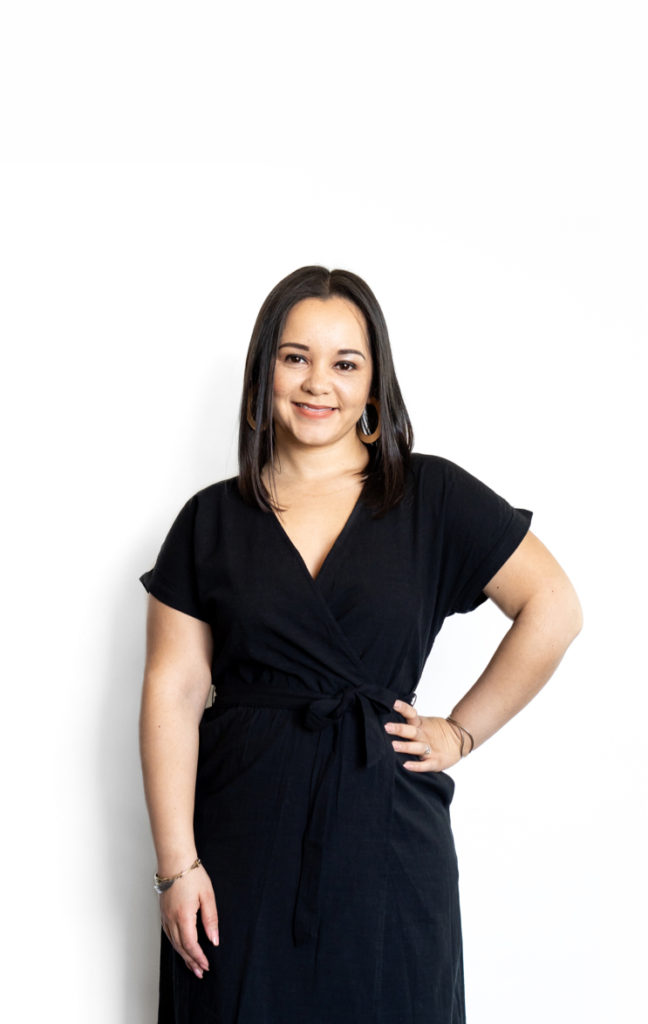 A portrait of Charlena Ortiz in black